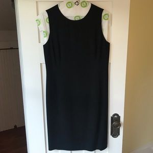 Classic knee-length black sleeveless shift dress
